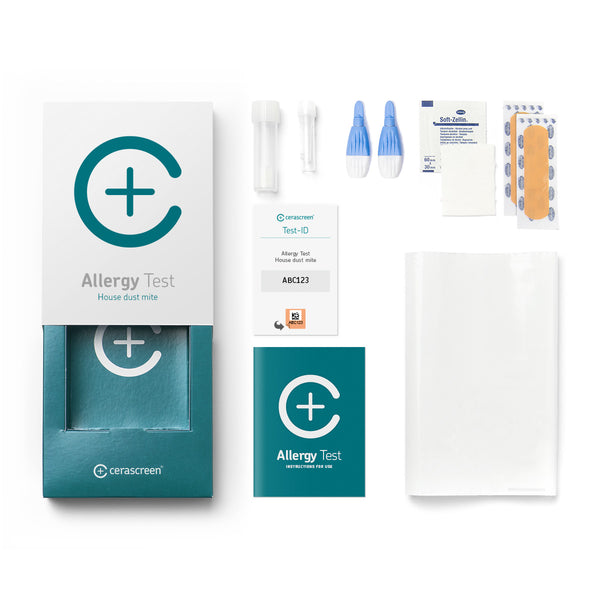 Contents of the House Dust Mite Allergy Testkit from Cerascreen: Packaging, instructions, lancets, plaster, dry blood card, disinfection wipe, return envelope